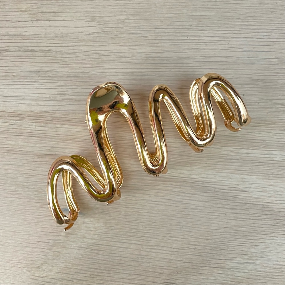 ANTHROPOLOGIE gold squiggle clip